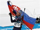 ZLATO. Slovenská biatlonistka Anastasia Kuzminová v cíli olympijského závodu s...