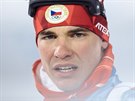 Český biatlonista Michal Krčmář v olympijském sprintu na 10 kilometrů v...