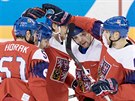GÓL. Čeští hokejisté slaví branku Michala Řepíka v olympijském utkání se...