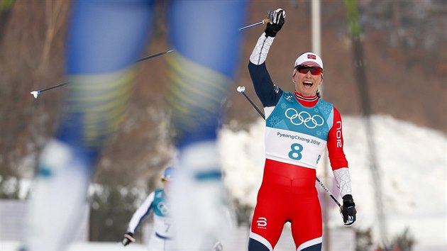 Norsk� b�kyn� Marit Bj�rgenov� v c�li skiatlonov�ho z�vodu na 15 kilometr� v pchong�changsk�m Alpensia Cross-Country Skiing Centre. (10. �nora 2018)