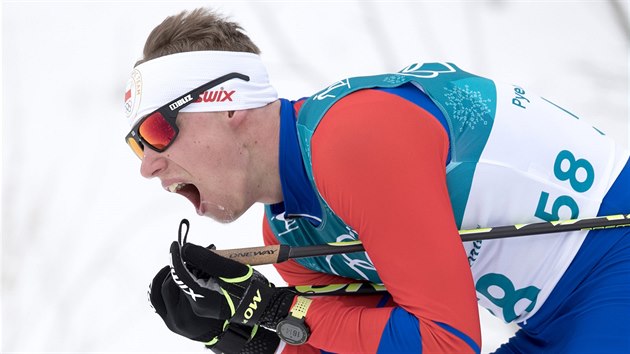 Český běžec Petr Knop ve skiatlonovém závodě na 15+15 kilometrů v pchongčchangském Alpensia Cross-Country Skiing Centre. (11. února 2018)