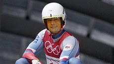 Český sáňkař Ondřej Hyman v cíli první olympijské jízdy. (10. února 2018)