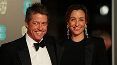 Hugh Grant a Anna Ebersteinová na udílení cen BAFTA (Londýn, 18. února 2018)