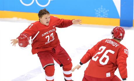 ZLATO. Rut hokejist slav vtzstv v olympijskm finle proti Nmecku....