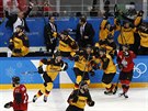 Nmetí hokejisté slaví okující výhru nad Kanadou v semifinále olympijského...