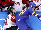 Anna Borgqvist (18), of Sweden, checks Yurie Adachi (11), of Japan, during the...