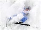 Eric Loughran, of the United States, crashes during the men's...