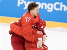 ZLATO. Rutí hokejisté slaví vítzství v olympijském finále proti Nmecku....