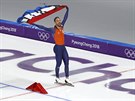 Nizozemský rychlobrusla Kjeld Nuis slaví olympijský triumf na kilometrové...
