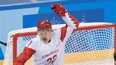 Ruský útoník Kirill Kaprizov se raduje z první ruské branky v olympijském...