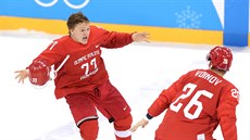 ZLATO. Ruští hokejisté slaví vítězství v olympijském finále proti Německu....