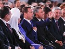 Ruský premiér Dmitrij Medvedv na pedvolebním vystoupení Vladimira Putina v...