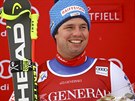 výcarský lya Beat Feuz se usmívá poté, co v superobím slalomu v Kvitfjellu...