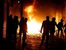 Plameny v ulicích pi násilných nepokojích v Madridu