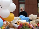 Ruský prezident Vladimir Putin uctil památku obtí poáru obchodního centra v...