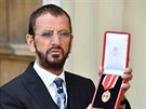 Ringo Starr obdrel ád britského impéria s hodností rytí-komandér. (Londýn,...