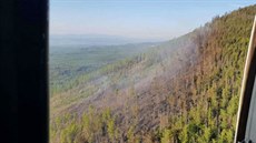 Rozsáhlý poár, který zasáhl ve tvrtek odpoledne Vysoké Tatry, mají u hasii...