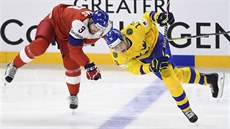 Radko Gudas v tvrdém souboji s Mattiasem Janmarkem