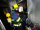 V pízemním byt na praském ikov vypukl poár, hasii z domu evakuovali...