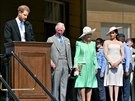 Princ Harry, princ Charles s manželkou Camillou a vévodkyně ze Sussexu Meghan...