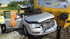 Na elezniním pejezdu v Chrástu u Plzn se  srazil vlak s osobním vozidlem....
