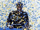 Draymond Green z Golden State Warriors zasypávaný konfetami bhem oslav titulu
