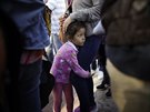 Migranti v Tijuan ekají na hranicích USA, aby mohli podat ádost o azyl (13....