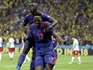 Yerry Mina z Kolumbie (s íslem 13) slaví gól v utkání proti Polsku se...