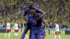 Yerry Mina z Kolumbie (s íslem 13) slaví gól v utkání proti Polsku se...