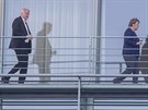 Německá kancléřka Angela Merkelová a ministr vnitra Horst Seehofer na balkoně...