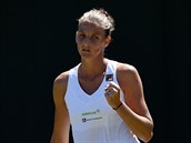 Česká tenistka Karolína Plíšková se raduje z úspěšné výměny v prvním kole...