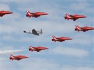 The Red Arrows, Royal Air Force Aerobatic Team, are joined by a Spitfire at the...