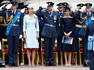 Princ William, vévodkyn Kate, princ Harry a vévodkyn Meghan bhem oslav 100....