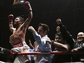 Manny Pacquiao slaví titul mistra světa ve welterové váze organizace WBA.