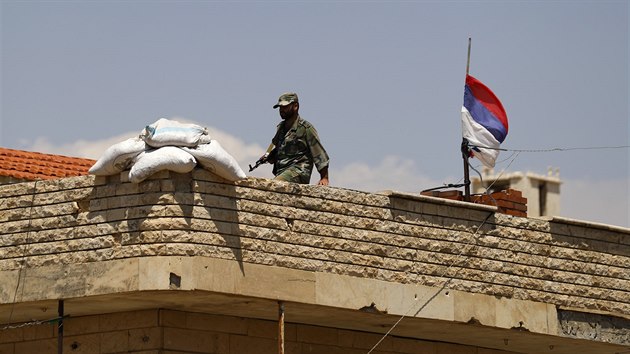 Syrské vládní jednotky ve městě Talbísa (17. července 2018)