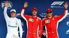 Kvalifikaci na Velkou cenu Německa ovládl Sebastian Vettel (uprostřed), druhý...