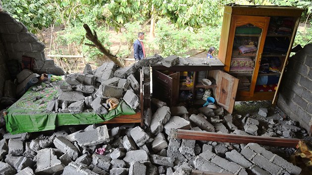A damaged house is seen after an earthquake hit Sajang village in Lombok Timur