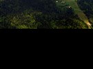 Leteck pohled na rakousk lyask arel Hochficht. Za vrcholy Hraninku...
