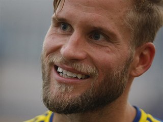 Petr Tlustý z Jihlavy se usmívá po vyhraném utkání s Táborskem.