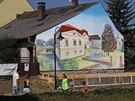 Malba na fasád domu nacházejícího se poblí místa vyhoelého zámku v Odrách.