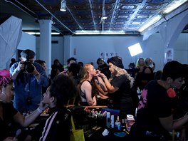 Model Madeline Stuart, who has Down's syndrome, is prepared backstage before...
