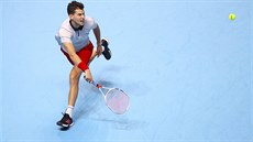 Rakouský tenista Dominic Thiem v duelu s Keiem Niikorim z Japonska.