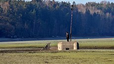 Návtvníky pehrady Hracholusky odrazuje zelená voda. Odborníci tvrdí, ena vin jsou sloueniny fosforu.