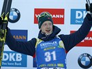 POTIADVACÁTÉ.  Norský biatlonista Johannes Thingnes Bö slaví vítzství ve...
