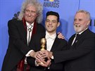Brian May a Roger Taylor slaví s hercem Ramim Malekem úspch filmu o kapele...