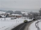 Pohled na zasnenou krajinu z kabiny jednoho ze sypa udrujcho prjezdnost...