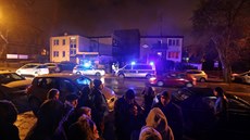 Policejní auta ped budovou provozovny únikových her v Koszalinu. (4. ledna...