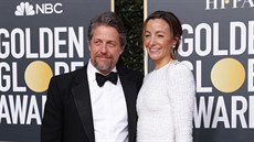 Hugh Grant a Anna Ebersteinová na Zlatých glóbech (Beverly Hills, 6. ledna 2019)