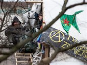 V pond�l� 14. ledna 2019 byla na st�e�e budovy skupinka posledn�ch aktivist�,...