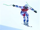 Johan Clarey z Francie ve výskoku bhem superobího slalomu v Kitzbühelu
